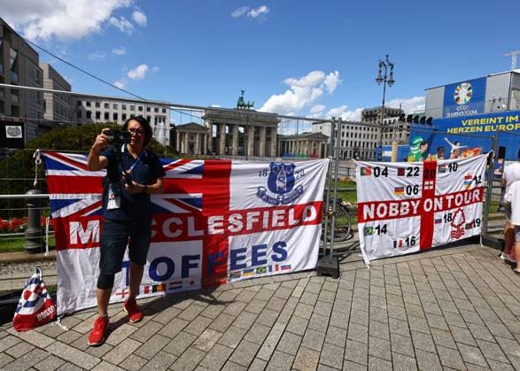 Berlin, Germany, 14th July 2024. England fans arriving in Berlin outside the Brandenburg Gate ahead of the UEFA European Championships final match at Olympiastadion, Berlin. Picture credit should read: David Klein Sportimage EDITORIAL USE ONLY. No use with unauthorised audio, video, data, fixture lists, club league logos or live services. Online in-match use limited to 120 images, no video emulation. No use in betting, games or single club league player publications. SPI-3228-0004
