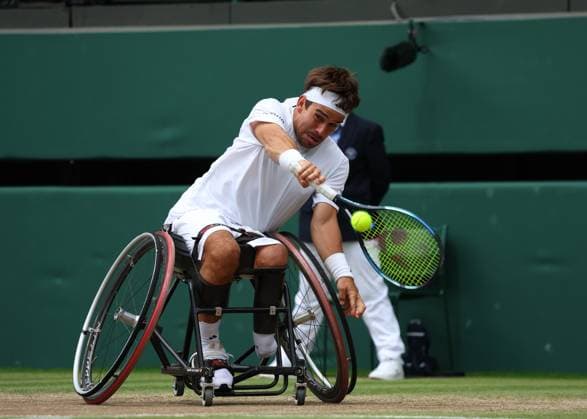 14th July 2024; All England Lawn Tennis and Croquet Club, London, England; Wimbledon Tennis Tournament, Day 14; Martin De La Puente (ESP) from the baseline against Alfie Hewett (GBR), Gentlemens Wheelchair Singles Final  ActionPlus12667801 JohnxPatrickxFletcher