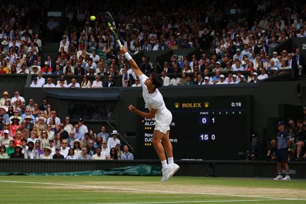 14th July 2024; All England Lawn Tennis and Croquet Club, London, England; Wimbledon Tennis Tournament, Day 14; Carlos Alcaraz (ESP) serves to Novak Djokovic (SRB), Gentlemens Singles Final  ActionPlus12667981 JohnxPatrickxFletcher