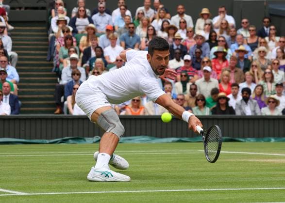 14th July 2024; All England Lawn Tennis and Croquet Club, London, England; Wimbledon Tennis Tournament, Day 14; Novak Djokovic (SRB) at the net against Carlos Alcaraz (ESP), Gentlemens Singles Final  ActionPlus12667985 JohnxPatrickxFletcher