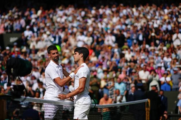 Carlos Alcaraz celebrates victory in the Gentlemen s Singles final against Novak Djokovic Wimbledon Tennis Championships, Day 14, The All England Lawn Tennis and Croquet Club, London, UK - 14 Jul 2024  Copyright: xJavierxGarcia Shutterstockx 14584814eh