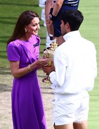 Catherine Princess of Wales presents Carlos Alcaraz with the winners trophy after victory in the Gentlemen s Singles final Wimbledon Tennis Championships, Day 14, The All England Lawn Tennis and Croquet Club, London, UK - 14 Jul 2024  Copyright: xJamesxMarsh Shutterstockx 14584815cs