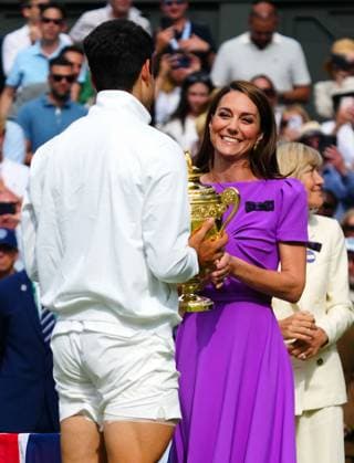 Catherine Princess of Wales presents Carlos Alcaraz with the winners trophy after victory in the Gentlemen s Singles final Wimbledon Tennis Championships, Day 14, The All England Lawn Tennis and Croquet Club, London, UK - 14 Jul 2024  Copyright: xJavierxGarcia Shutterstockx 14584814fi