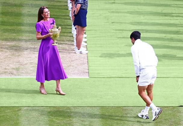 Catherine Princess of Wales presents Carlos Alcaraz with the winners trophy after victory in the Gentlemen s Singles final Wimbledon Tennis Championships, Day 14, The All England Lawn Tennis and Croquet Club, London, UK - 14 Jul 2024  Copyright: xJamesxMarsh Shutterstockx 14584815cx