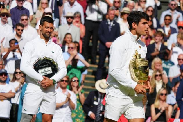 Carlos Alcaraz and Novak Djokovic after the Gentlemen s Singles final Wimbledon Tennis Championships, Day 14, The All England Lawn Tennis and Croquet Club, London, UK - 14 Jul 2024  Copyright: xJavierxGarcia Shutterstockx 14584814fz