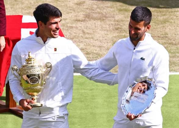 Carlos Alcaraz and Novak Djokovic after the Gentlemen s Singles final Wimbledon Tennis Championships, Day 14, The All England Lawn Tennis and Croquet Club, London, UK - 14 Jul 2024  Copyright: xJamesxMarsh Shutterstockx 14584815dj