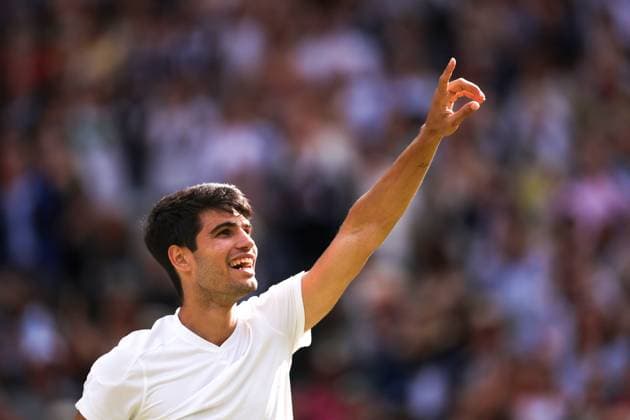 Carlos Alcaraz celebrates victory in the Gentlemen s Singles final Wimbledon Tennis Championships, Day 14, The All England Lawn Tennis and Croquet Club, London, UK - 14 Jul 2024  Copyright: xEllaxLing Shutterstockx 14584816ap