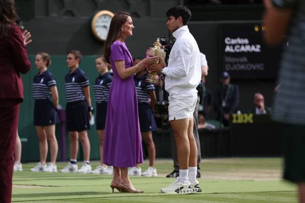 Catherine Princess of Wales greets Carlos Alcaraz of Spain during the trophy presentation ceremony Wimbledon Tennis Championships, Day 14, The All England Lawn Tennis and Croquet Club, London, UK - 14 Jul 2024  Copyright: xEllaxLing Shutterstockx 14584816bs