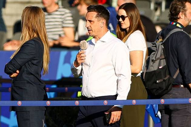 Gary Neville of ITV with a portable fan pitchside Spain v England, UEFA European Championship, EM, Europameisterschaft 2024, Final, Football, Olympiastadion, Berlin, Germany, 14 Jul 2024 EDITORIAL USE ONLY No use with unauthorised audio, video, data, fixture lists, club league logos or live services. Online in-match use limited to 120 images, no video emulation. No use in betting, games or single club league player publications. Copyright: xKieranxMcManus Shutterstockx 14583341v