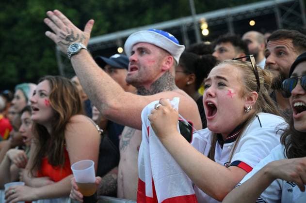 Germany Soccer Euro 2024 Spain - England Broadcast 8729246 14.07.2024 England s fans react as they watch the broadcast of the UEFA EURO, EM, Europameisterschaft,Fussball 2024 final match between Spain and England in a fanzone at the Brandenburg gate, in Berlin, Germany. Alexey Filippov Sputnik Berlin Germany  Copyright: xAlexeyxFilippovx
