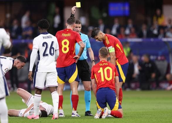 Berlin, Germany, 14th July 2024. Dani Olmo of Spain receives a yellow card during the UEFA European Championships final match at Olympiastadion, Berlin. Picture credit should read: David Klein Sportimage EDITORIAL USE ONLY. No use with unauthorised audio, video, data, fixture lists, club league logos or live services. Online in-match use limited to 120 images, no video emulation. No use in betting, games or single club league player publications. SPI-3228-0081