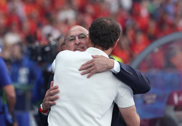 (240714) -- BERLIN, July 14, 2024 -- Spain s head coach Luis de la Fuente (L) and England s head coach Gareth Southgate react before the UEFA EURO, EM, Europameisterschaft,Fussball 2024 final match between England and Spain in Berlin, Germany, July 14, 2024. ) (SP)GERMANY-BERLIN-FOOTBALL-EURO 2024-FINAL-ENGLAND VS SPAIN PanxYulong 