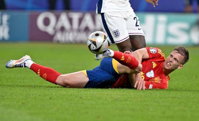 14 07 2024, Football UEFA EURO 2024, Final at Berlin Olympic Stadium, Spain England, Dani Olmo Spain fights on the ground