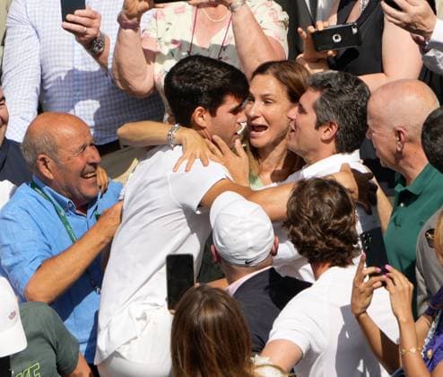 Lawn Tennis - 2024 Wimbledon Championship Mens singles final Novak Djokovic (SRB) v Carlos Alcaraz (ESP) All England Lawn Tennis & Croquet Club - Sunday 14th July 2024 Carlos Alcaraz climbs into the players box to hug his Mother and Father 