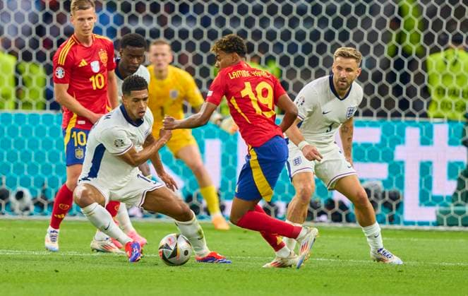 Jude Bellingham, ENG 10 Luke Shaw, England 3 compete for the ball, tackling, duel, header, zweikampf, action, fight against Lamine Yamal, ESP 19 in the final match SPAIN - ENGLAND of the UEFA European Championships 2024 on Jul 14, 2024 in Berlin, Germany.