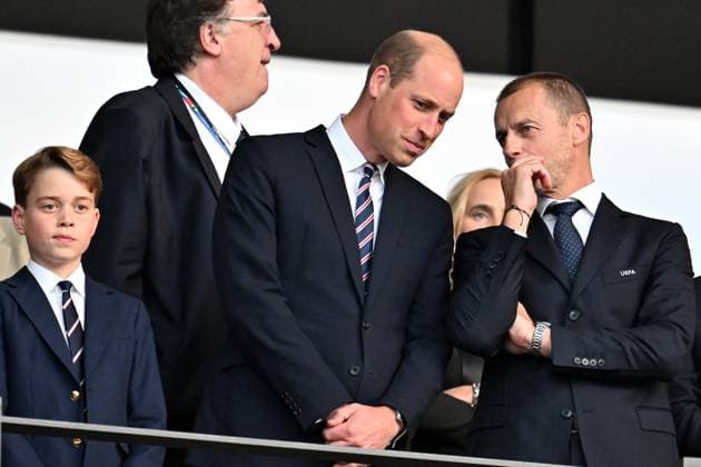 140724 KAI SCHWOERER HRH Prince William, Prince of Wales and FA president, his son George and UEFA president Aleksander Ceferin (R) look on prior to the UEFA EURO, EM, Europameisterschaft,Fussball 2024 final match between Spain and England at Olympiastadion on July 14, 2024 in Berlin, Germany. 140724-CPL-ESPvENG-005