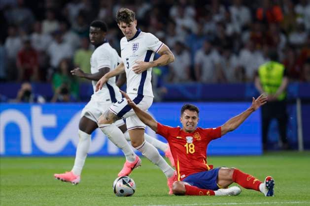 Spain v England: Final - UEFA EURO, EM, Europameisterschaft,Fussball 2024 John Stones of England and Martin Zubimendi of Spain challenge during the UEFA EURO 2024 final match between Spain and England at Olympiastadion on July 14, 2024 in Berlin, Germany. Berlin Olympiastadion Germany Germany Copyright: xRichardxSellers Sportsphoto APLx 14045711
