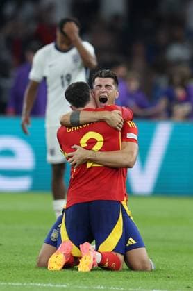 Berlin, Germany, 14th July 2024. Alvaro Morata of Spain (R) celebrates at the final whistle with Dani Carvajal of Spain during the UEFA European Championships final match at Olympiastadion, Berlin. Picture: Paul Terry Sportimage EDITORIAL USE ONLY. No use with unauthorised audio, video, data, fixture lists, club league logos or live services. Online in-match use limited to 120 images, no video emulation. No use in betting, games or single club league player publications. SPI-3227-0121