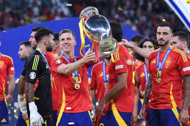 Soccer UEFA EURO 2024 Final Spain England on 14 07 2024 at the Olympiastadion Berlin in Berlin Dani Olmo Spain with the European Championship Cup with the Henri Delaunay Cup xRx