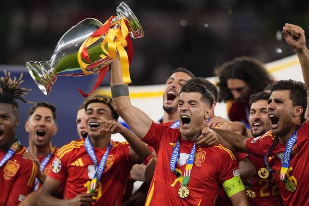 Spain s Alvaro Morata vith the trophy for the celebration after the final match between Spain and England at the Euro 2024 soccer tournament in Berlin at Olympiastadium, Germany, Sunday, July 14, 2024 - Soccer .  Copyright: xFabioxFerrari LaPressex