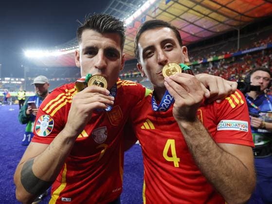 Berlin, Germany, 14th July 2024. Alvaro Morata of Spain (L) alongside Mikel Oyarzabal of Spain with their winners medals during the UEFA European Championships final match at Olympiastadion, Berlin. Picture: Paul Terry Sportimage EDITORIAL USE ONLY. No use with unauthorised audio, video, data, fixture lists, club league logos or live services. Online in-match use limited to 120 images, no video emulation. No use in betting, games or single club league player publications. SPI-3227-0126