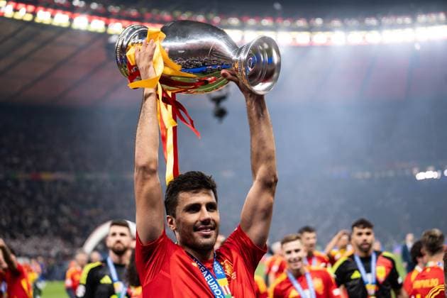 GER, Euro 2024, Final, Spain ESP vs England GBR 14 07 2024, Olympiastadion Berlin, Berlin, GER, Euro 2024, Final, Spain ESP vs England GBR In the picture Rodri Spain ESP, 16 with European Championship trophy in his hand, celebrates, is happy, emotions, holds up the trophy nordphotoxGmbHxx xChristianxSchulze nph000300