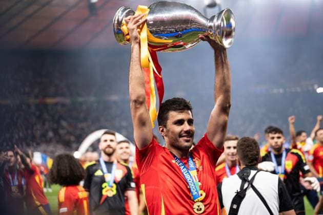 GER, Euro 2024, Final, Spain ESP vs England GBR 14 07 2024, Olympiastadion Berlin, Berlin, GER, Euro 2024, Final, Spain ESP vs England GBR In the picture Rodri Spain ESP, 16 with European Championship trophy in his hand, celebrates, is happy, emotions, holds up the trophy nordphotoxGmbHxx xChristianxSchulze nph000300
