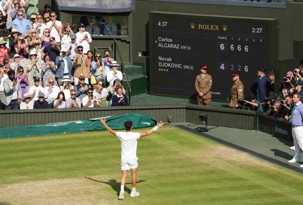 Lawn Tennis - 2024 Wimbledon Championship Mens singles final Novak Djokovic (SRB) v Carlos Alcaraz (ESP) All England Lawn Tennis & Croquet Club - Sunday 14th July 2024 Carlos Alcaraz looks to his Players box to celebrate after winning match point 