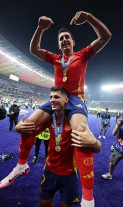 Berlin, Germany, 14th July 2024. Winning goal scorer Mikel Oyarzabal of Spain is lifted onto the shoulders of Alvaro Morata of Spain as they celebrate victory during the UEFA European Championships final match at Olympiastadion, Berlin. Picture: Paul Terry Sportimage EDITORIAL USE ONLY. No use with unauthorised audio, video, data, fixture lists, club league logos or live services. Online in-match use limited to 120 images, no video emulation. No use in betting, games or single club league player publications. SPI-3227-0128