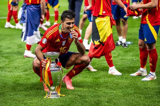240714 Rodrigo Hernandez of Spain celebrates with the trophy after the UEFA Euro 2024 Football Championship final between Spain and England on July 14, 2024 in Berlin Photo Mathias Bergeld BILDBYRAN code MB MB0946 fotboll football soccer fotballs em europamästerskap em uefa euro uefa european football championship euro 2024 final spanien spain england bbeng jubel  Copyright: MATHIASxBERGELD BB240714MB185
