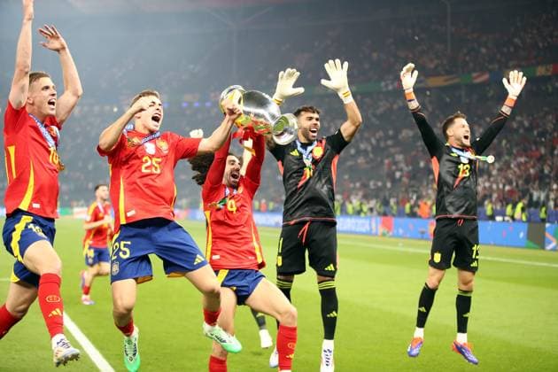 14 07 2024, xtgx, Football EM 2024 Final, Spain England emspor, v l Daniel Olmo Carvajal Spain , Fermin Lopez Marin Spain , Jose Ignacio Fernandez Iglesias Nacho Spain , Ferran Torres Garcia Spain , Alejandro Remiro Spain with EM Cup UEFA REGULATIONS PROHIBIT ANY USE OF PHOTOGRAPHS as IMAGE SEQUENCES and or QUASI VIDEO Berlin