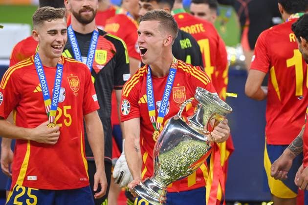 from right Dani OLMO ESP , Fermin LOPEZ ESP with trophy,cup,trophaee, jubilation,joy,enthusiasm, award ceremony, FINAL Spain ESP England ENG 2 1 on 14 07 2024, Olympiastadion Berlin Football UEFA EURO 2024 GERMANY from 14 06 2024 14 07 2024
