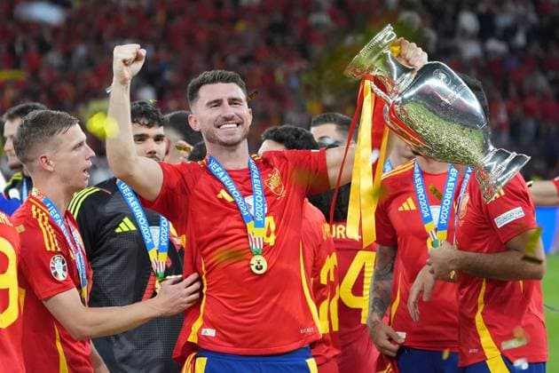 Aymeric Laporte Spain Spain, 14 receives the Henri Delaunay trophy and celebrates winning the title with the team Berlin 14 07 2024 Spain vs England, M51, EURO2024 Final, Olympiastadion Berlin
