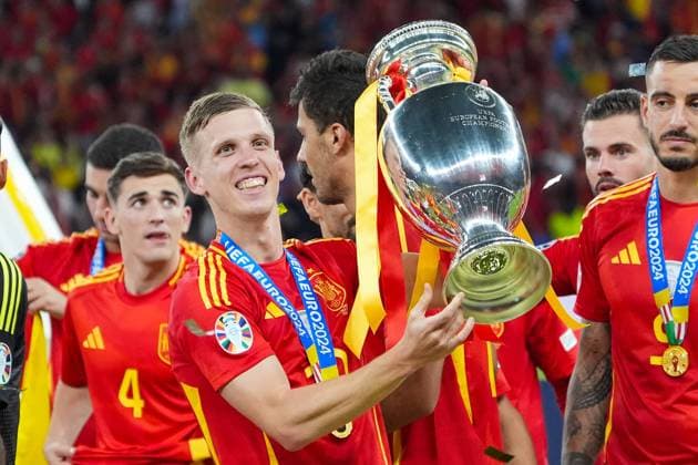 Dani Olmo Spain Spain, 10 receives the Henri Delaunay trophy and celebrates winning the title with the team Berlin 14 07 2024 Spain vs England, M51, EURO2024 Final, Olympiastadion Berlin