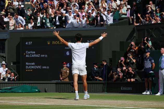 14th July 2024; All England Lawn Tennis and Croquet Club, London, England; Wimbledon Tennis Tournament, Day 14; Carlos Alcaraz (ESP) celebrates towards his coaches after defeating Novak Djokovic (SRB) in straight sets, Gentlemens Singles Final  ActionPlus12668209 JohnxPatrickxFletcher