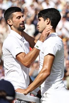 Novak Djokovic, SRB, with Carlos Alcaraz, ESP, after final of 2024 All England Lawn Tennis Championships at Wimbledon, gentlemens singles, London, 14 07 2024