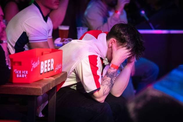 July 14, 2024, Manchester, United Kingdom: A fan holds his head after England gets defeated at Euro 2024 Final match at Freight Island. Thousands of supporters fill fan zones across the country to watch the big game, which sees England take on Spain. Manchester United, ManU Kingdom - ZUMAs197 20240714_aaa_s197_120 Copyright: xAndyxBartonx