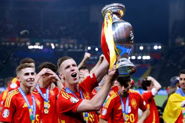 OLMO Dani Team Spain at the award ceremony with the winners trophy European Championships 2024 Germany EURO 2024 Match Final SPA ENG 2 1 on 14 07 2024 in Berlin DFL REGULATIONS PROHIBIT ANY USE OF PHOTOGRAPHS as IMAGE SEQUENCES and or QUASI VIDEO Copyright: xLacixPerenyix