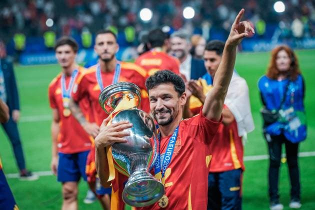 EURO 2024 - Final: Spain vs. England Jesus Navas poses with the trophy, as Spain are crowned Champions of Europe, winning the trophy a record four times, after the EURO 2024 Final match between Spain and England on 13 July 2024, at Olympic Stadium Berlin, in Berlin, Germany Berlin Olympic Stadium Berlin Germany Copyright: xAlexandraxFechetex _ADR6783