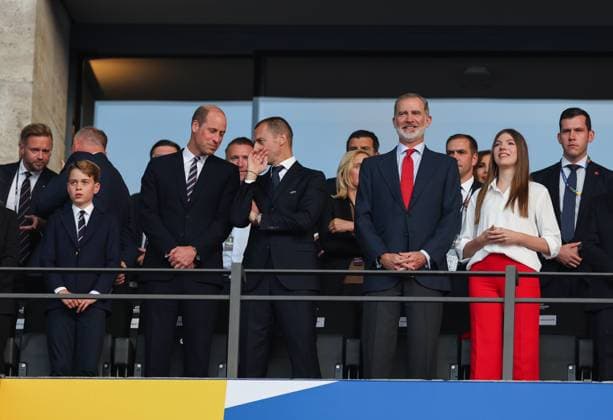 (240715) -- BERLIN, July 15, 2024 -- UEFA President Aleksander Ceferin (C) talks to Britain s Prince William (front 2nd L) as Britain s Prince George (frontg 1st L) and Spain s King Felipe VI wait for the start of the UEFA EURO, EM, Europameisterschaft,Fussball 2024 final match between England and Spain in Berlin, Germany, July 14, 2024. ) (SP)GERMANY-BERLIN-FOOTBALL-EURO 2024-FINAL-ENGLAND VS SPAIN ZhangxFan 