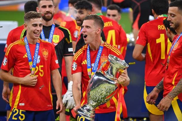 Dani OLMO ESP with trophy, cup, trophy, jubilation, joy, enthusiasm, left Fermin LOPEZ ESP, award ceremony, FINAL Spain ESP England ENG 2 1 on 14 07 2024, Olympiastadion Berlin Football UEFA EURO 2024 GERMANY from 14 06 2024 14 07 2024