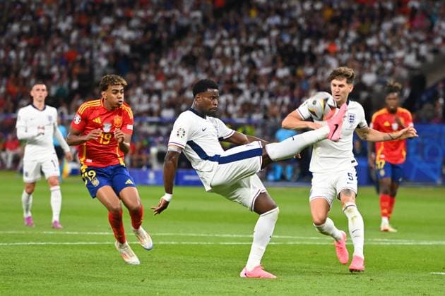 Marc GUEHI ENG on the ball, left Yamal LAMINE ESP , right John STONES ENG , action FINAL Spain ESP England ENG 2 1 on 14 07 2024, Olympiastadion Berlin Football UEFA EURO 2024 GERMANY from 14 06 2024 14 07 2024