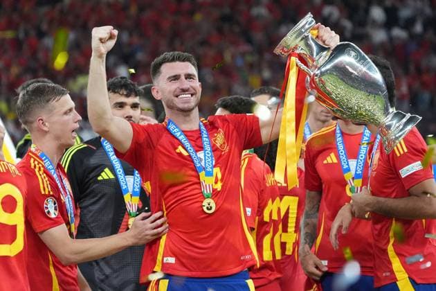 Spain celebrating victory around Aymeric Laporte Spain Spain, 14 with the Henri Delaunay Cup Berlin 14 07 2024 Spain vs England, M51, EURO2024 Final, Olympiastadion Berlin