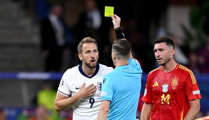 Football Euro 2024 Final 14 07 2024 Spain England Harry Kane left, England gets the yellow card from referee Francois Letexier center, FRA, France next to Aymeric Laporte right, Spain