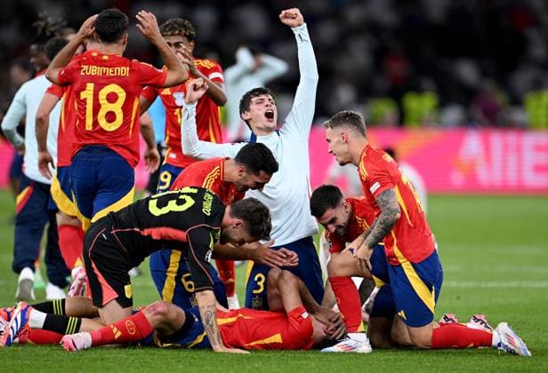 Football Euro 2024 Final 14 07 2024 Spain England final cheer Spain, the players lie on the goal scorer to 2 1 Mikel Oyarzabal at the bottom
