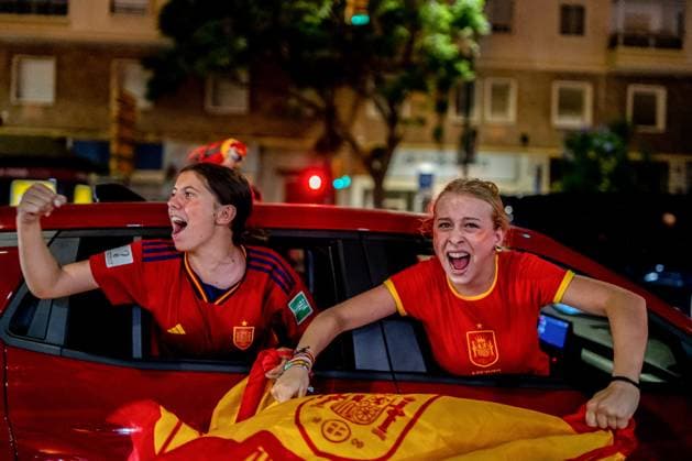 July 15, 2024, Malaga, Spain: Two woman seen celebrating and showing the Spanish flag during the celebration in Malaga of the victory of Spain at the UEFA EURO, EM, Europameisterschaft,Fussball 2024. Spain won the UEFA Euro 2024 after a match against England celebrated at Olympiastadion in Berlin, Germany. Malaga Spain - ZUMAs197 0711374369st Copyright: xFrancisxGonzalezx