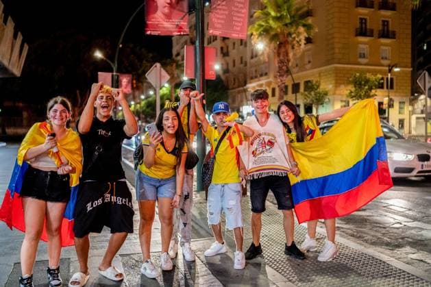 July 15, 2024, Malaga, Spain: Colombia football fans celebrate in Malaga the victory of Spain against England at the UEFA EURO, EM, Europameisterschaft,Fussball 2024. Spain won the UEFA Euro 2024 after a match against England celebrated at Olympiastadion in Berlin, Germany. Malaga Spain - ZUMAs197 0711375420st Copyright: xFrancisxGonzalezx
