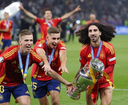 Dani Olmo, Fermin Lopez, Marc Cucurella with trophy, Spain Spanish team celebrates European Championship jubilation after European Championship victory Joy Emotion Sport Football Soccer European Championship Euro 2024 European Championship Final Men Season 2023 2024 14 07 2024 Spain ESP vs England ENG in Berlin Olympiastadion DFL regulations prohibit any use of photographs as image sequences and or quasi video