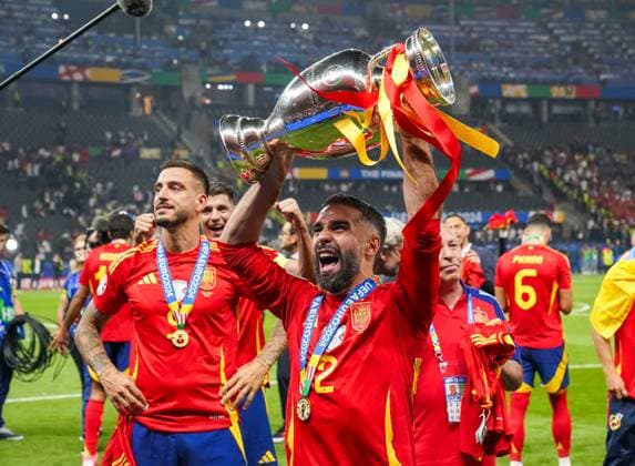 Spain v England Spain Defender Dani Carvajal Real Madrid celebrates winning with trophy during the Spain v England UEFA EURO, EM, Europameisterschaft,Fussball 2024 Final at the Olympiastadion Stadium, Berlin, Germany on 14 July 2024 Editorial use only. All images are copyright Every Second Media Limited. No images may be reproduced without prior permission. Copyright: xIMAGO EveryxSecondxMediax ESM-1060-0223