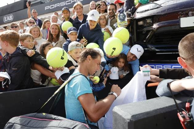 BASTAD, SWEDEN 20240715 Rafael Nadal, Spain, signs autographs after winning the doubles match with Casper Ruud, Norway, during the Nordea Open in Bastad on Monday BASTAD SWEDEN x9200x  Copyright: xAdamxIhse TTx NORDEA OPEN BASTAD